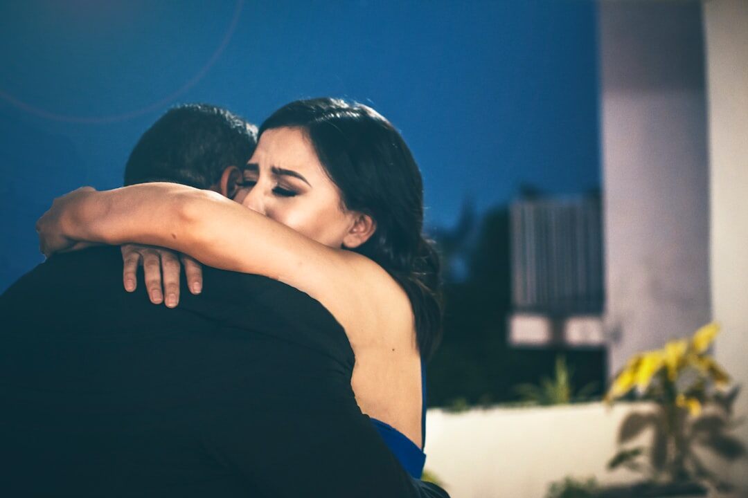 celebrity couple embracing