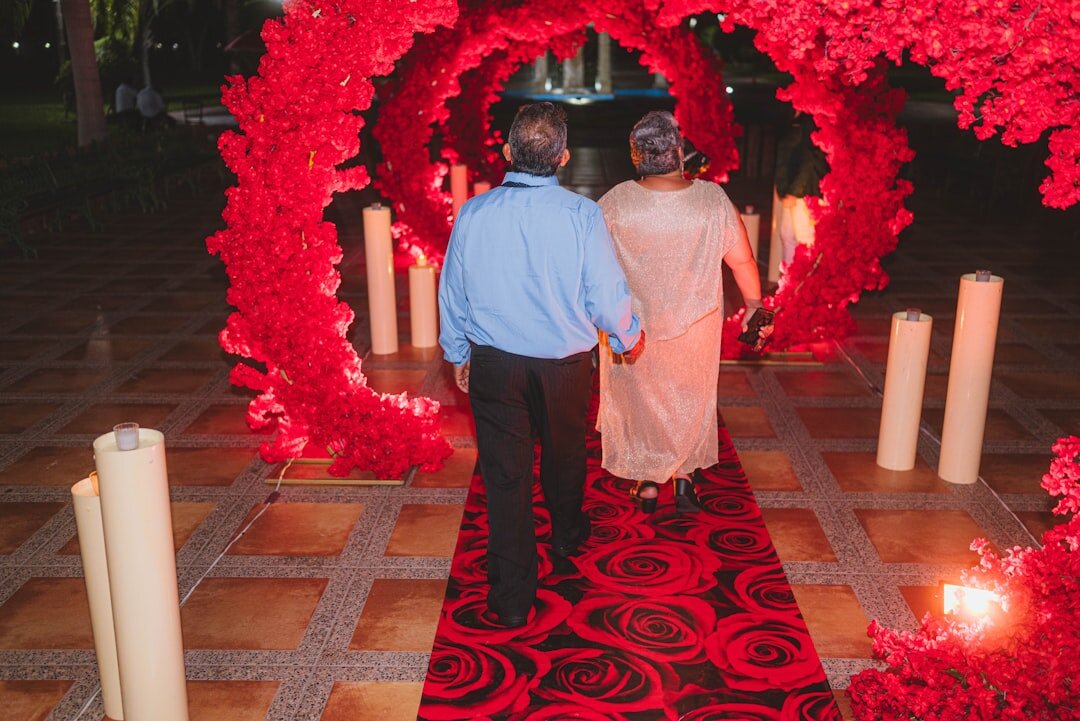 Red carpet event with camera flashes and crowd